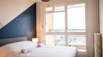 Un ou plusieurs lits dans un hébergement de l'établissement Le Montbernage - Beautiful modern apartment