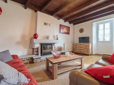 Coin salon dans l'établissement Holiday Home Gîte La Truffière Saintongeaise by Interhome