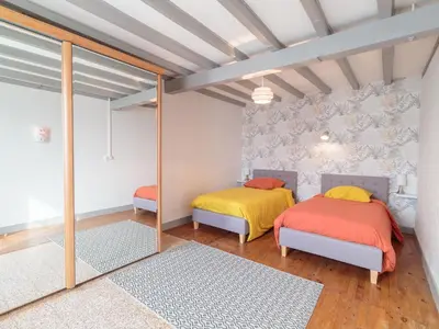Un ou plusieurs lits dans un hébergement de l'établissement Holiday Home Gîte La Truffière Saintongeaise by Interhome