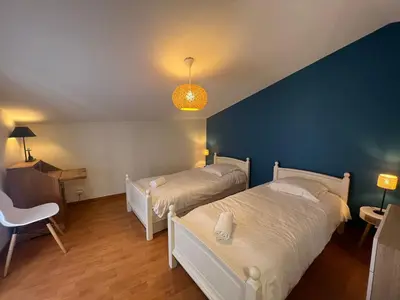 Un ou plusieurs lits dans un hébergement de l'établissement Le Havre Citadin - Maison de ville à Poitiers