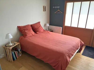 Un ou plusieurs lits dans un hébergement de l'établissement Studio des Lilas