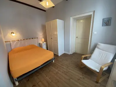 Un ou plusieurs lits dans un hébergement de l'établissement Maison de pêcheur en bord de mer à Fouras, 3 chambres - FR-1-709-44