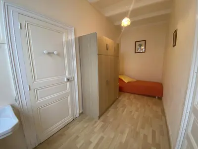 Un ou plusieurs lits dans un hébergement de l'établissement Maison de pêcheur en bord de mer à Fouras, 3 chambres - FR-1-709-44