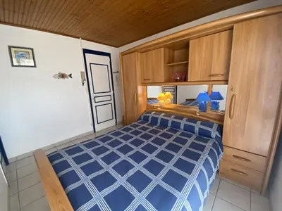 Un ou plusieurs lits dans un hébergement de l'établissement Appartement 4 pers. à Fouras, proche plage avec cour ensoleillée et stationnement - FR-1-709-37