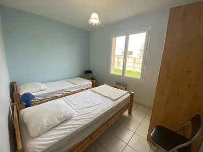 Un ou plusieurs lits dans un hébergement de l'établissement Villa récente de plain-pied à Fouras, proche mer - FR-1-709-51