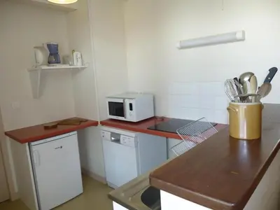 Cuisine ou kitchenette dans l'établissement Les coquelicots