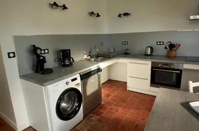 Cuisine ou kitchenette dans l'établissement La charmille