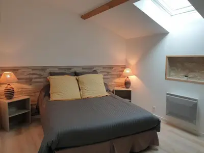 Un ou plusieurs lits dans un hébergement de l'établissement La maison poitevine