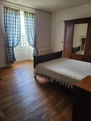 Un ou plusieurs lits dans un hébergement de l'établissement La maison du regisseur