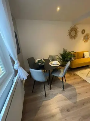 Coin salon dans l'établissement Le Sunny-hyper centre -proche gare - Paisible -WIFI HD -NETFLIX-Idéal couple business et famille