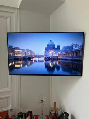 Télévision ou salle de divertissement dans l'établissement Chambre dans Hôtel Particulier 18e siècle Hyper Centre La Rochelle