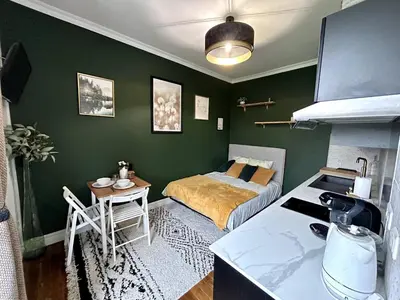 Un ou plusieurs lits dans un hébergement de l'établissement Appartement Cosy proche Futuroscope