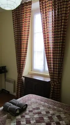 Un ou plusieurs lits dans un hébergement de l'établissement Maison Aunac