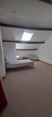 Un ou plusieurs lits dans un hébergement de l'établissement Maison Aunac