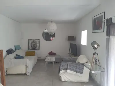 Coin salon dans l'établissement Appartement duplex 4 personnes