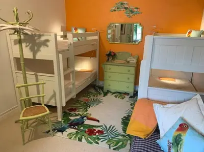 Un ou plusieurs lits dans un hébergement de l'établissement Gîte 2-4 couchages situé dans un magnifique jardin