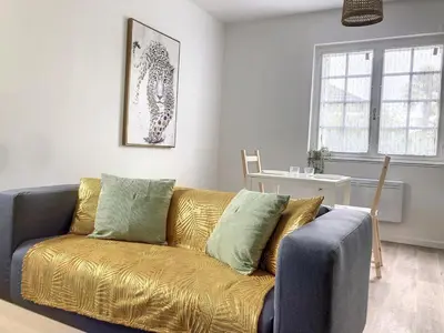 Coin salon dans l'établissement Résidence Appartements Niort wifi-parking