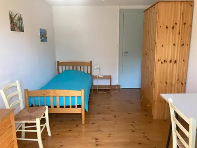 Un ou plusieurs lits dans un hébergement de l'établissement Gite des Noisettes à la porte de Saintes