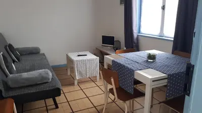 Coin salon dans l'établissement Maison de vacances familiale