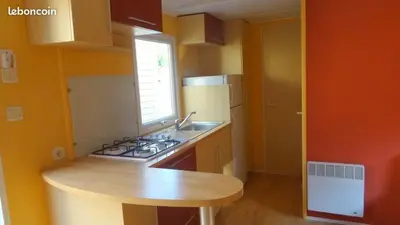 Cuisine ou kitchenette dans l'établissement Mobil-home Camping 3 étoiles