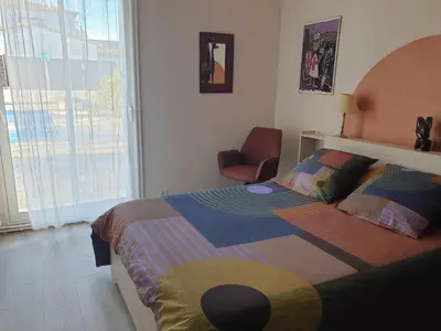 Un ou plusieurs lits dans un hébergement de l'établissement maison piscine