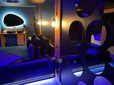 Un ou plusieurs lits dans un hébergement de l'établissement Suite Casanova avec SPA & Escape Love Game - Doux Bleu Jeux